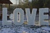 Love-Buchstaben mit Lampen Beleuchtung oder